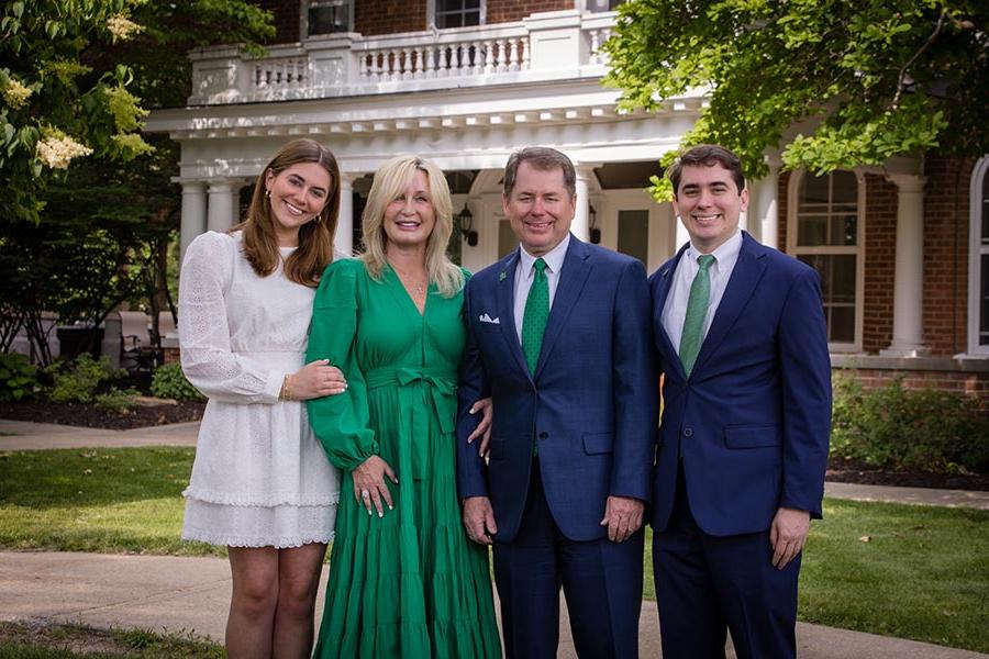 The Tatum family is pictured in front of the historic Thomas Gaunt House, which serves as the presidential residence on the Northwest campus. (Photo by Todd Weddle/Northwest Missouri State University)